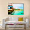 Old boat on the green sea with blue sky Multi Panel Canvas Wall Art