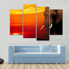 African elephant in savanna at sunset Multi panel canvas wall art