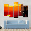 African elephant in savanna at sunset Multi panel canvas wall art