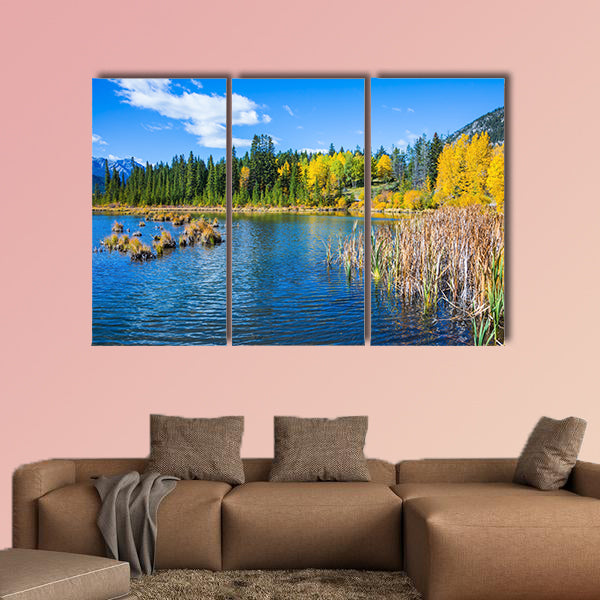 Indian warm summer on the lake Vermillon. Concept of ecotourism. Canadian province of Alberta, the Rocky Mountains, Banff Multi panel canvas wall art