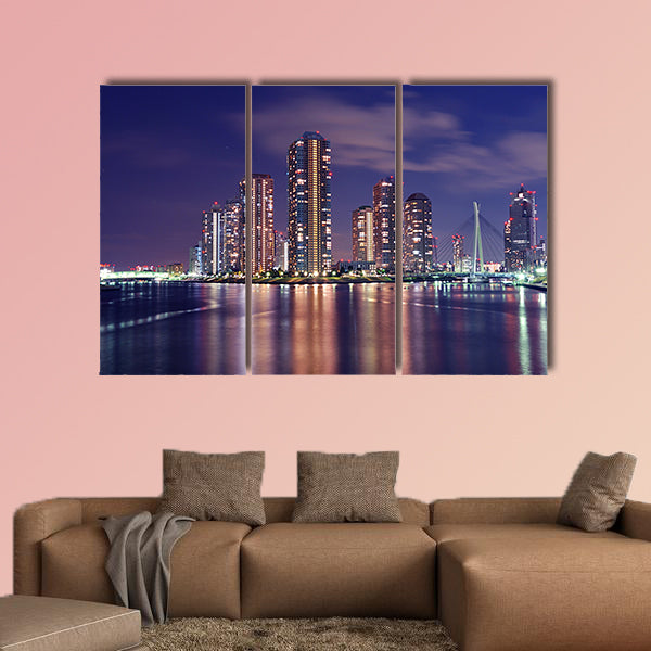 Tokyo skyline by night in modern Tsukishima district multi panel canvas wall art