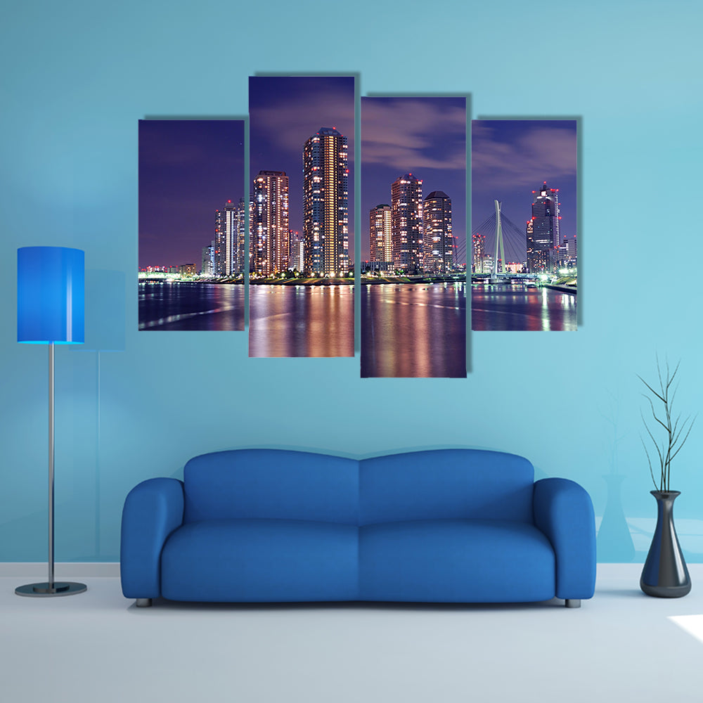 Tokyo skyline by night in modern Tsukishima district multi panel canvas wall art