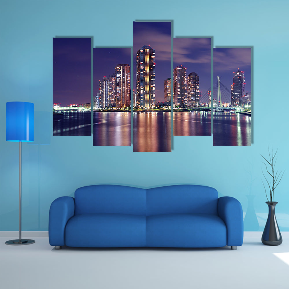Tokyo skyline by night in modern Tsukishima district multi panel canvas wall art