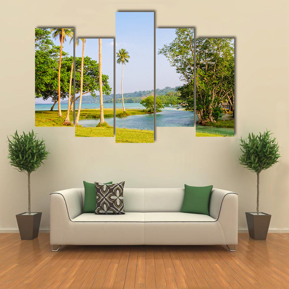 Fresh water flows from the blue hole into the Velit Bay Espiritu Santo Vanuatu Multi panel canvas wall art