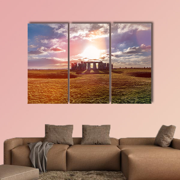 Stonehenge against the sun, Wiltshire, England Multi panel canvas wall art