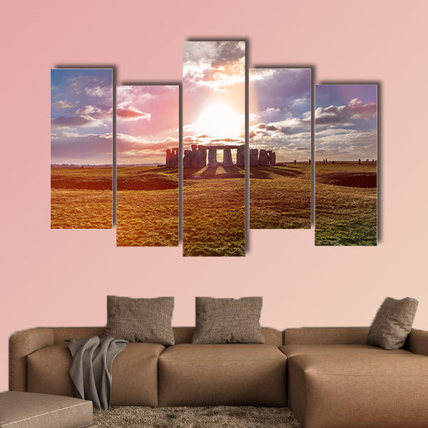 Stonehenge against the sun, Wiltshire, England Multi panel canvas wall art