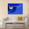 Image of a ping-pong ball with a racket on a table.multi panel canvas wall art