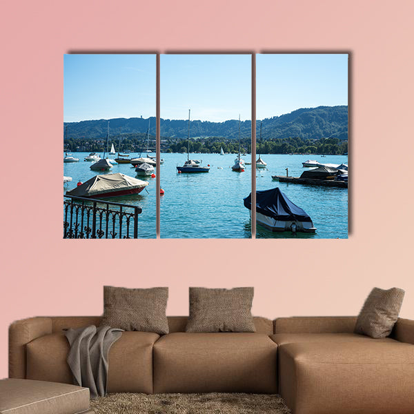 Boat on Lake Zurich in summer with uetliberg in the back wall art
