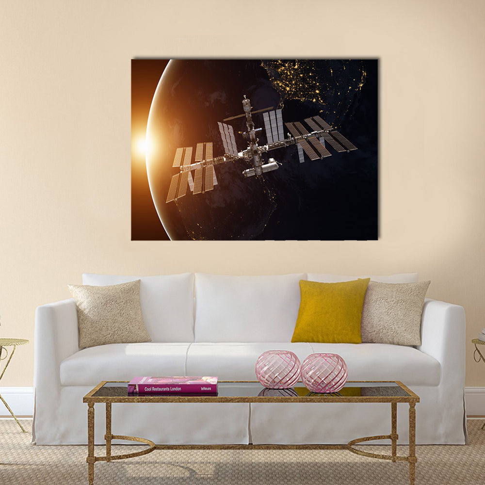 International Space Station over the planet Earth Multi Panel Canvas Wall Art
