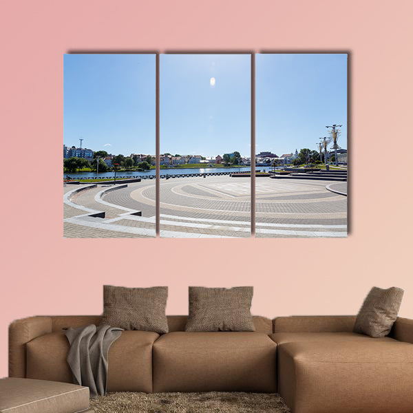 City center with a lake in sunny summer weather multi panel canvas wall art