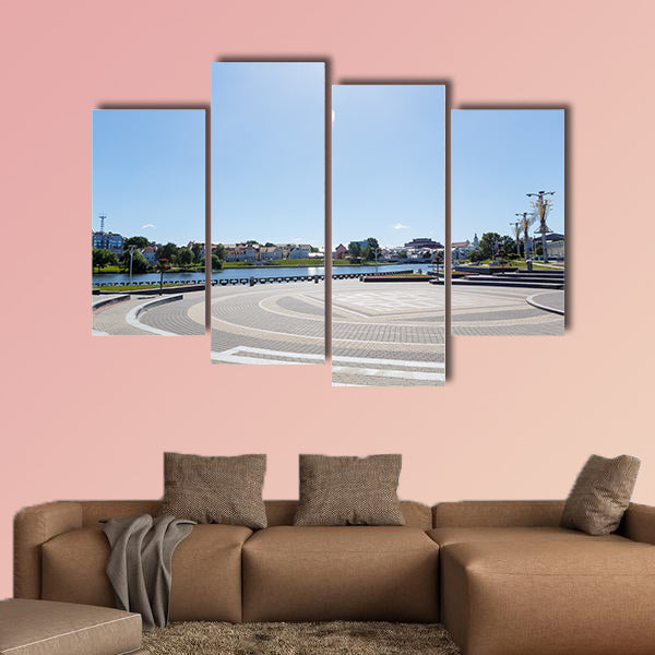 City center with a lake in sunny summer weather multi panel canvas wall art