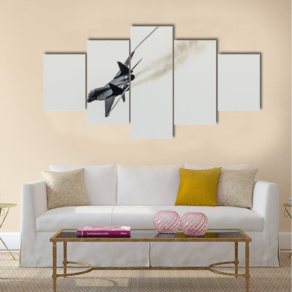 Aircraft fighter flies sharply turns with smoke from engines multi panel canvas wall art