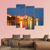 Nighttime view of Simuni village on Pag Island, Croatia multi panel canvas wall art