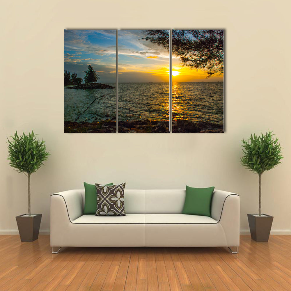 Beautiful Landscape view of the water, sky and clouds during sunset in city Bintulu multi panel canvas wall art