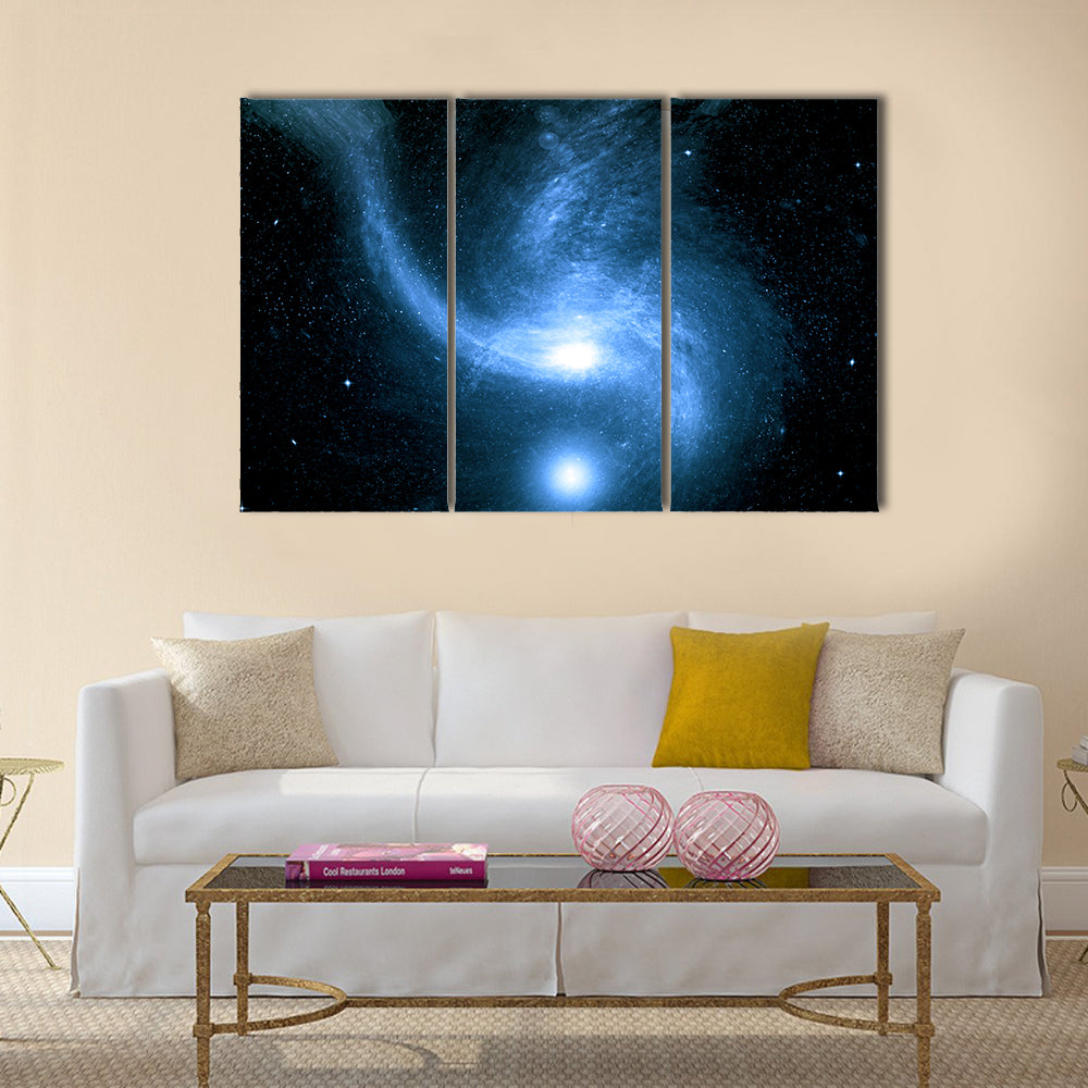 Stars of a planet and galaxy in a free space Multi Panel Canvas Wall Art