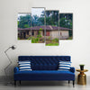 Almost destroyed houses in jungle of Cameroon where people live Multi panel canvas wall art