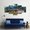 Almost destroyed houses in jungle of Cameroon where people live Multi panel canvas wall art