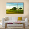 A beautiful golf course in Philippines during sunset Multi Panel Canvas Wall Art