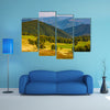 The Beech trees, meadow, on hillside with mountain ridge in a distance multi panel canvas wall art