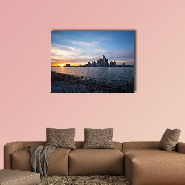 View of Detroit city skyline at sunset from the shore of the river wall art.