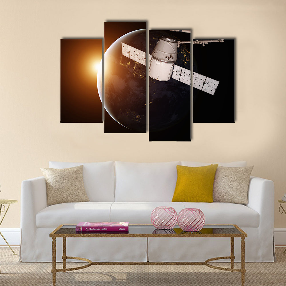 Satellite orbiting the planet Earth Multi Panel Canvas Wall Art
