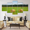 Green meadow with hay rolls Multi panel canvas wall art