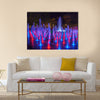 Night colorful fountain show inLublin park multi panel canvas wall art