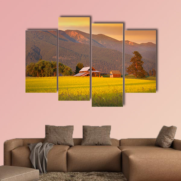 Rapeseed farm and barn in evening sun light Multi panel canvas wall art