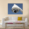 High tech overhead security camera with a gradient blue sky Multi panel canvas wall art