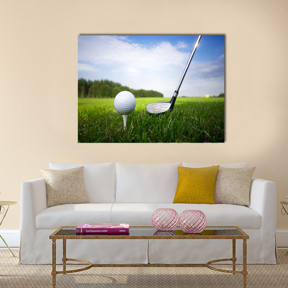 Playing golf. Golf club and ball. Preparing to shot Multi Panel Canvas Wall Art