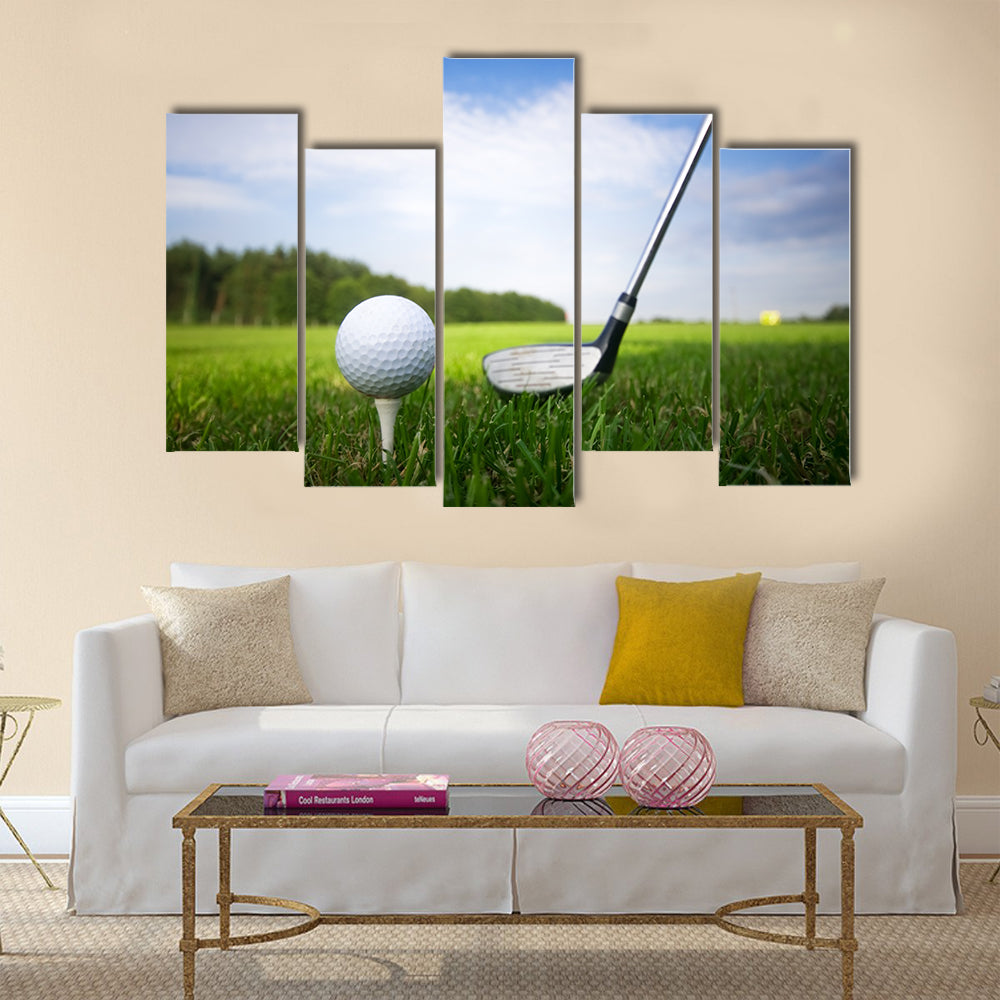 Playing golf. Golf club and ball. Preparing to shot Multi Panel Canvas Wall Art