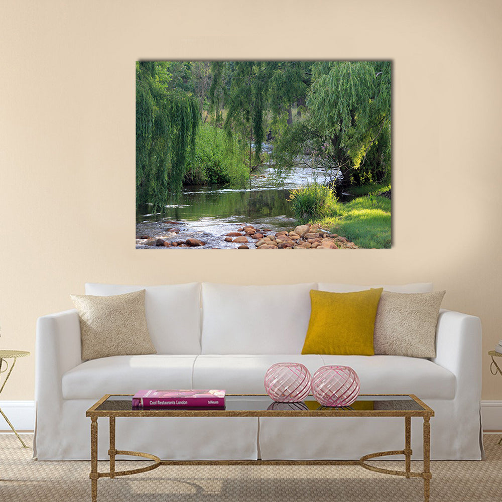 River flowing past willow trees Multi Panel Canvas Wall Art