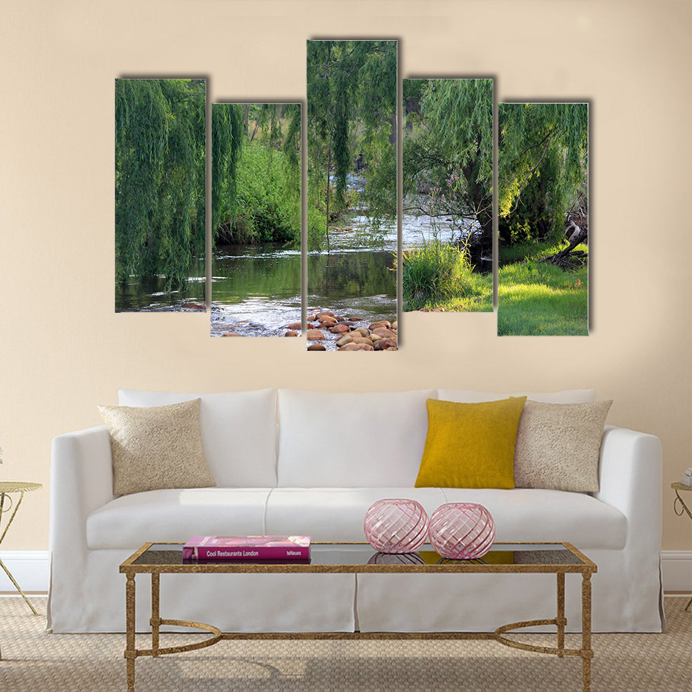 River flowing past willow trees Multi Panel Canvas Wall Art