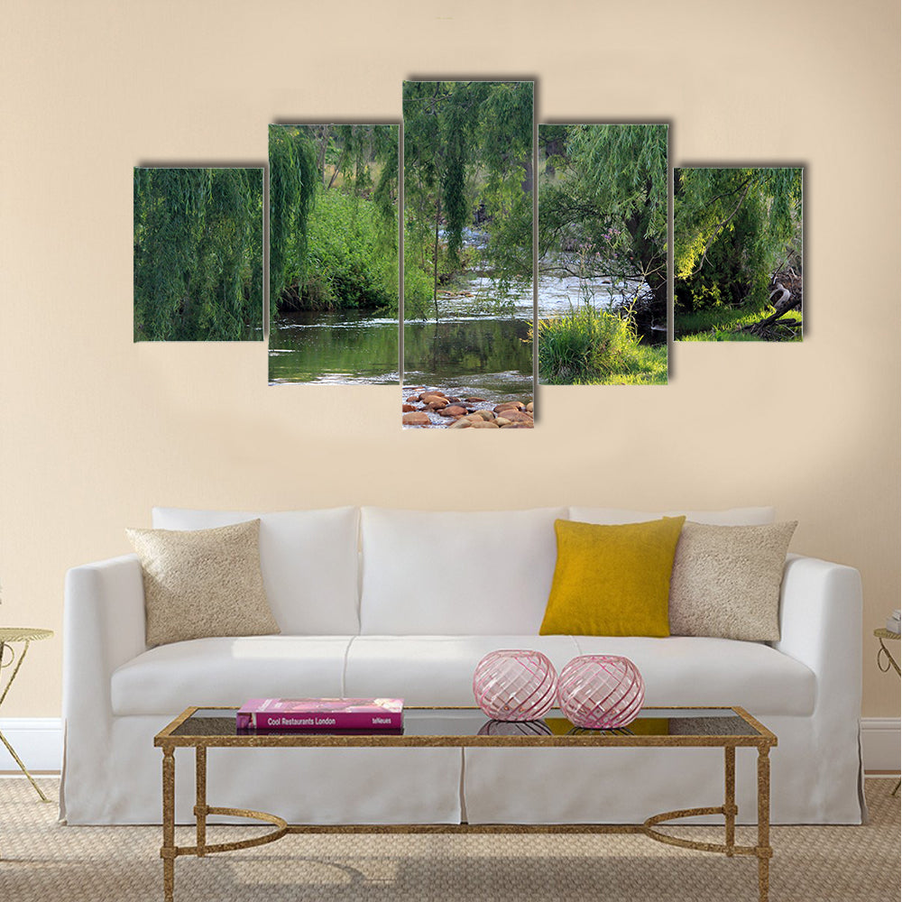 River flowing past willow trees Multi Panel Canvas Wall Art