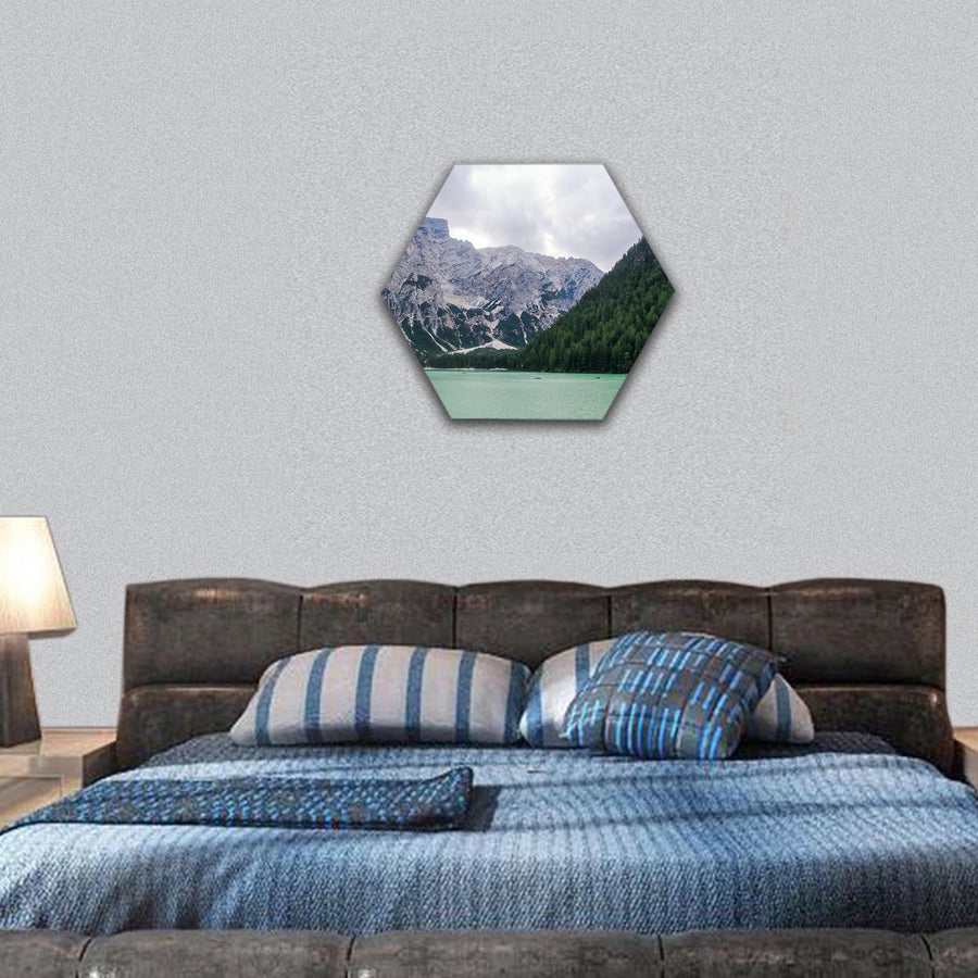 Emerlad water of lake of Braies in Alto Adige, Italy hexagonal canvas wall art