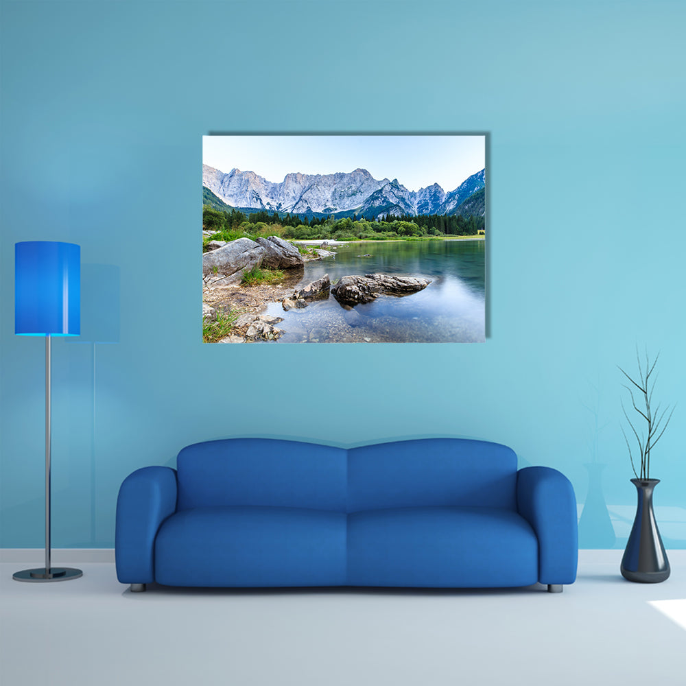The sun goes down in front of Mount Mangart in the Italian Alps multi panel canvas wall art