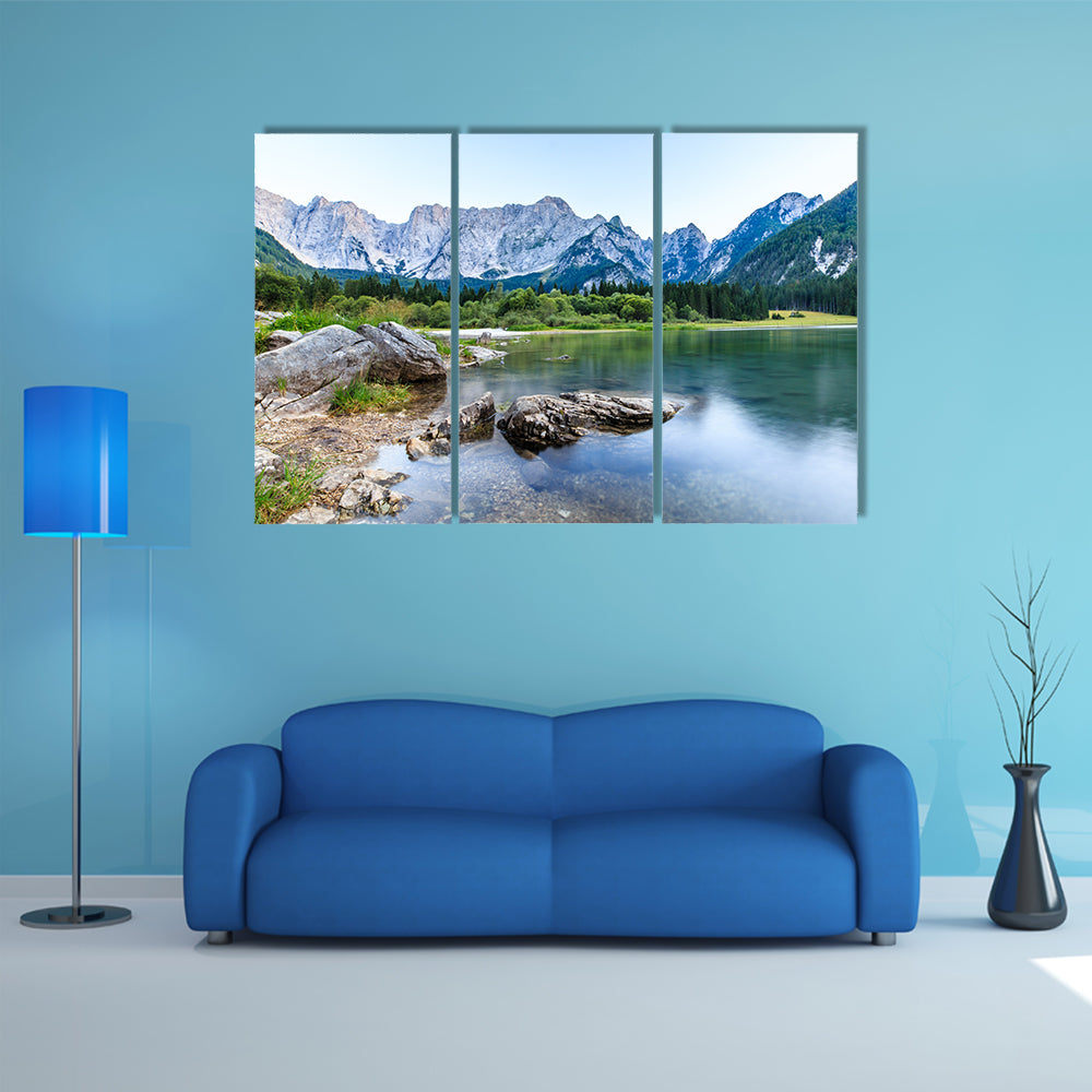 The sun goes down in front of Mount Mangart in the Italian Alps multi panel canvas wall art