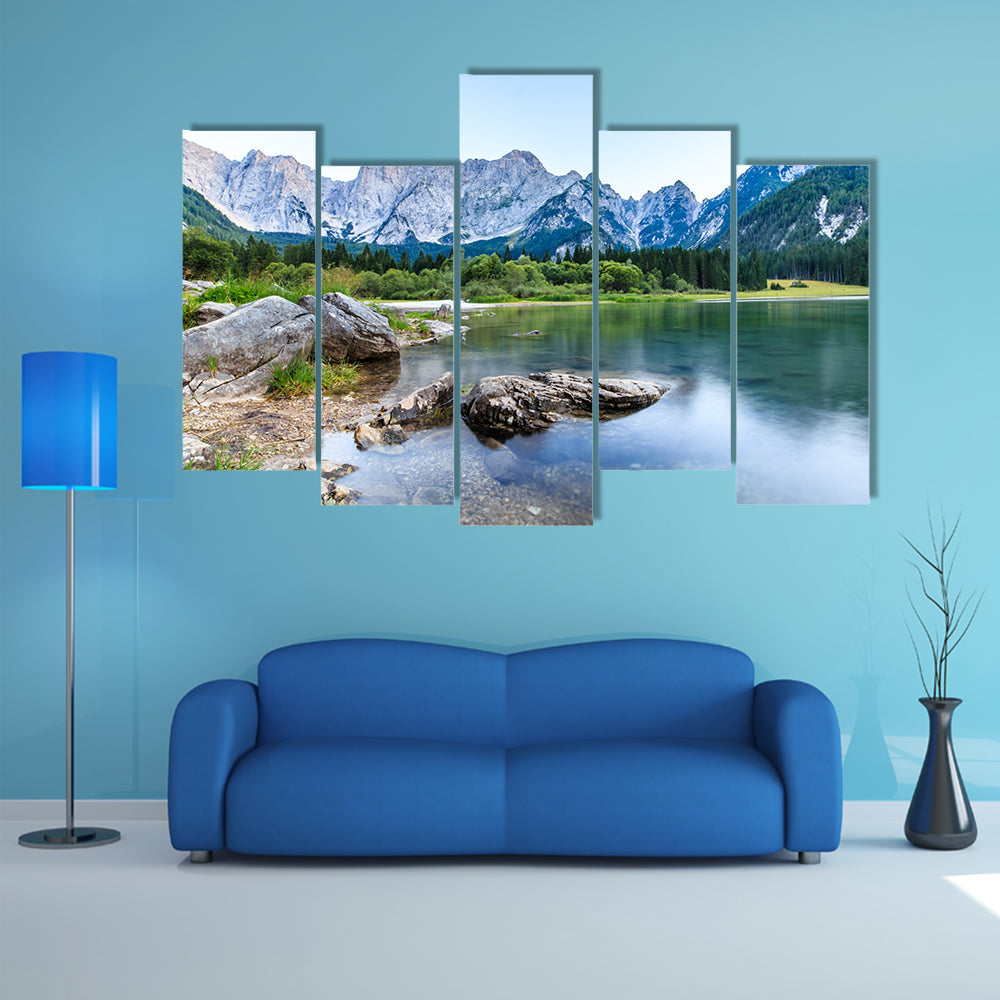 The sun goes down in front of Mount Mangart in the Italian Alps multi panel canvas wall art
