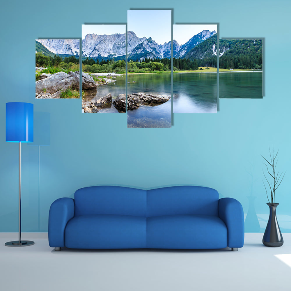 The sun goes down in front of Mount Mangart in the Italian Alps multi panel canvas wall art