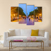 The evening walk along the illuminated Avenue with a view on the modern Clock Tower Multi panel canvas wall art