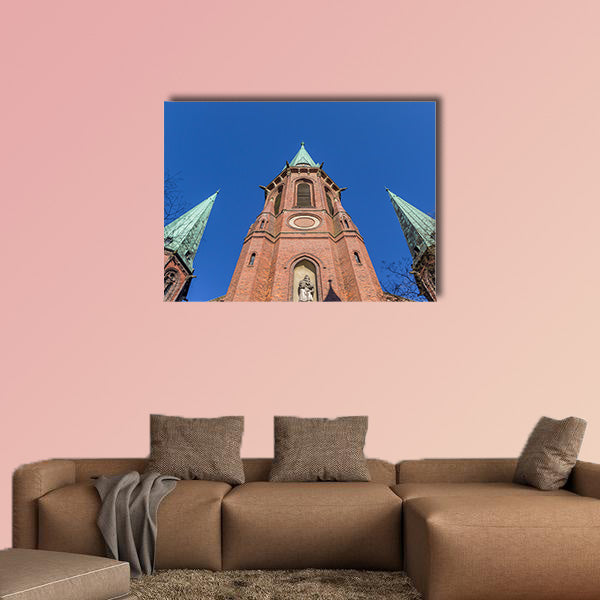 Towers of the Lamberti church in Oldenburg, Germany canvas wall art
