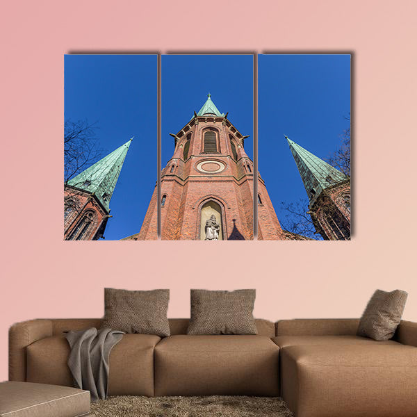 Towers of the Lamberti church in Oldenburg, Germany canvas wall art