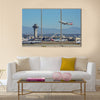 American Airline take off from the busy Los Angeles International Airport multi panel canvas wall art