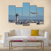 American Airline take off from the busy Los Angeles International Airport multi panel canvas wall art