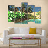 Luxurious tropical vegetation on wasteland later in the day Multi Panel canvas wall art