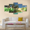 Luxurious tropical vegetation on wasteland later in the day Multi Panel canvas wall art