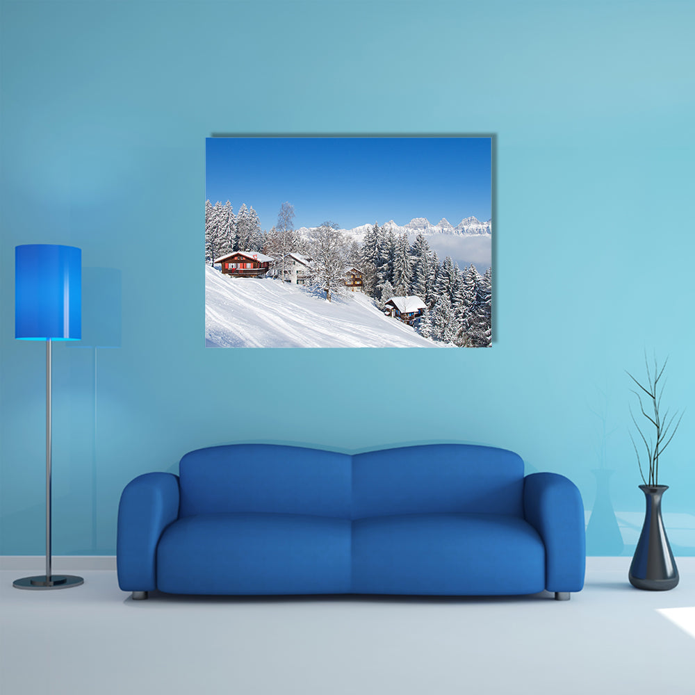 The Winter holiday house in Swiss alps Multi Panel Canvas Wall Art