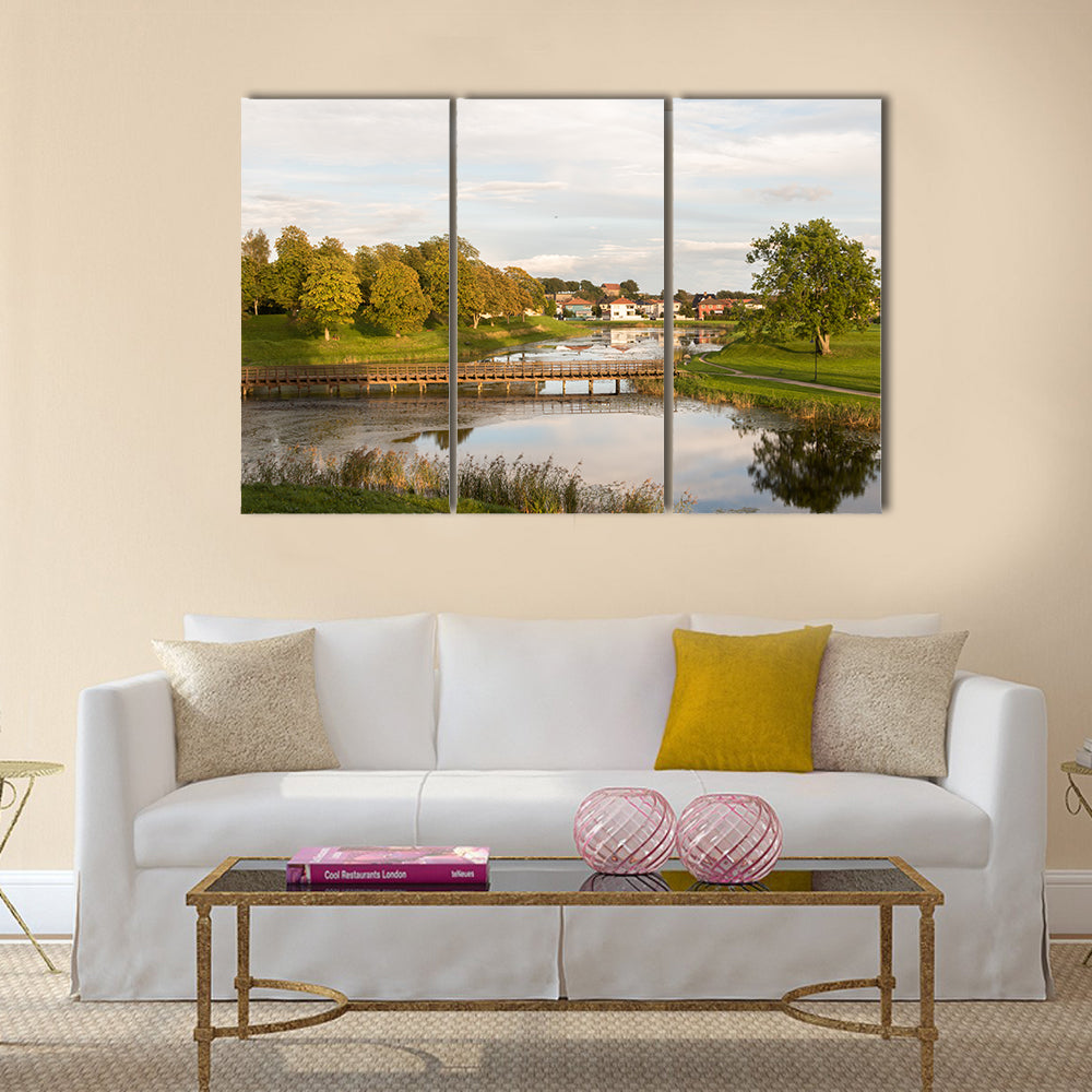 Bridge over the moat, in the old town in Fredrikstad, Norway multi panel canvas wall art