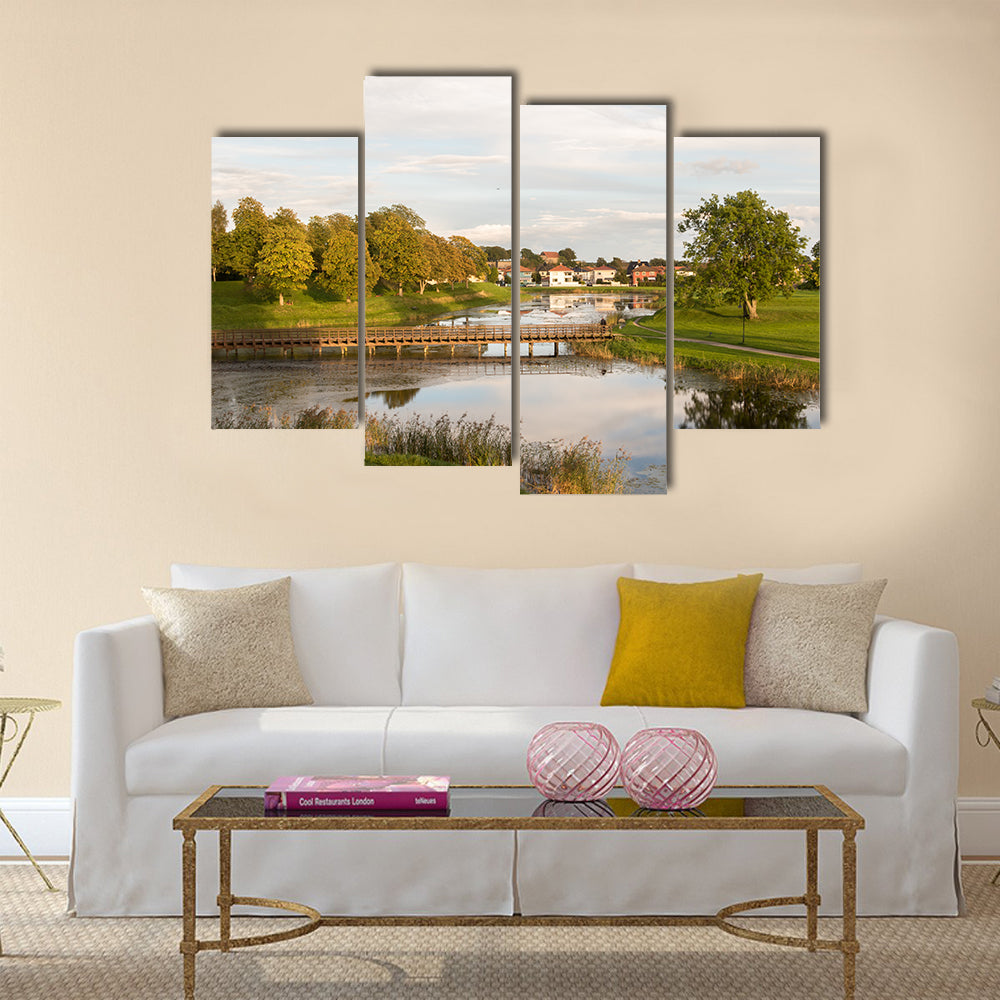 Bridge over the moat, in the old town in Fredrikstad, Norway multi panel canvas wall art