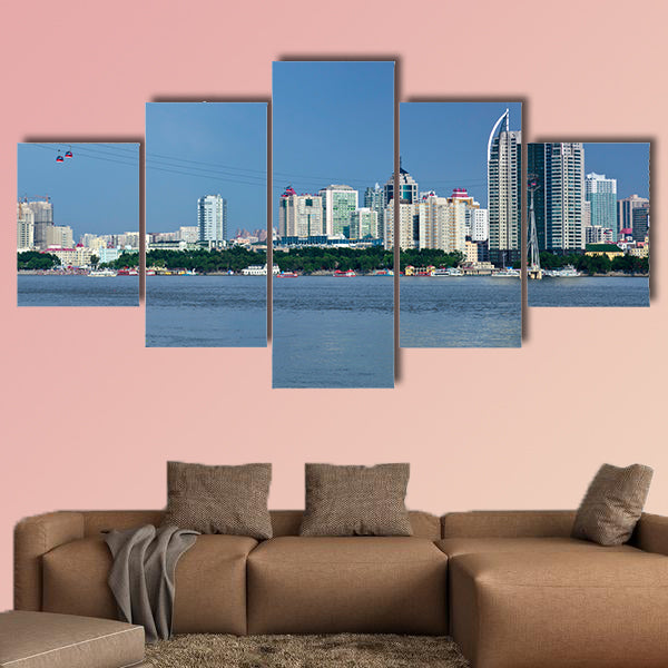The landscape scenery view of a city at the Songhua River, India multi panel canvas wall art